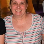 woman smiling in striped shirt